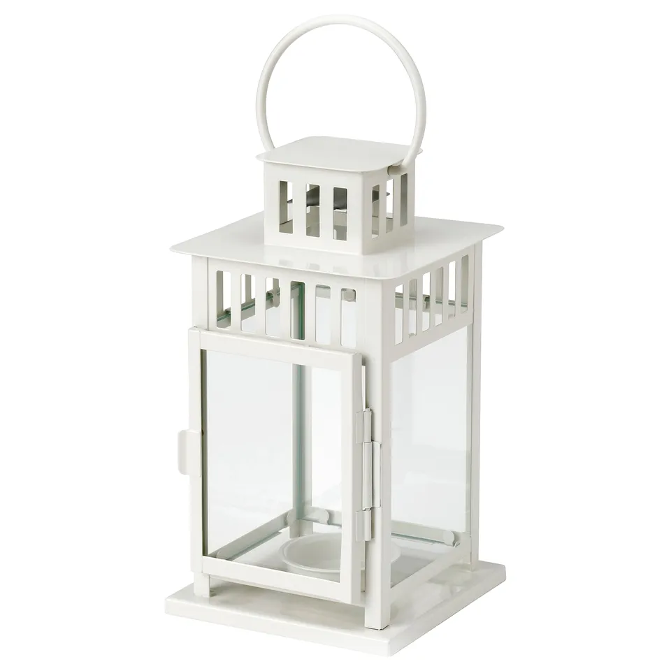 A white BORRBY lantern with a classic design. Its made of metal and glass, suitable for indoor or outdoor use.