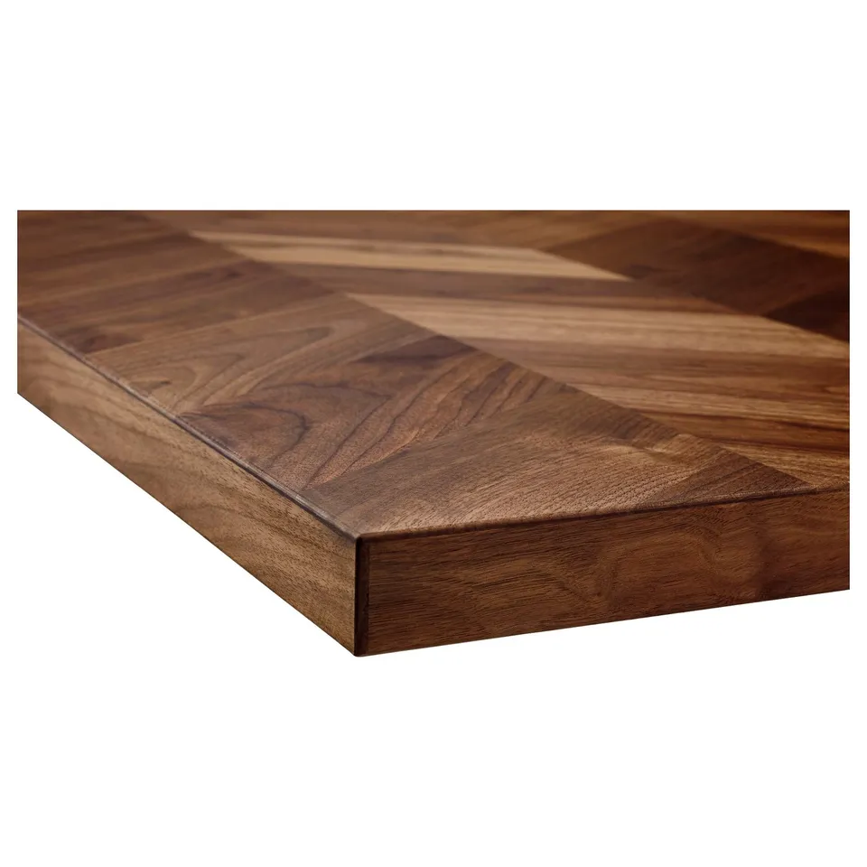 Dark wood worktop close-up: smooth, polished, rich patterns.