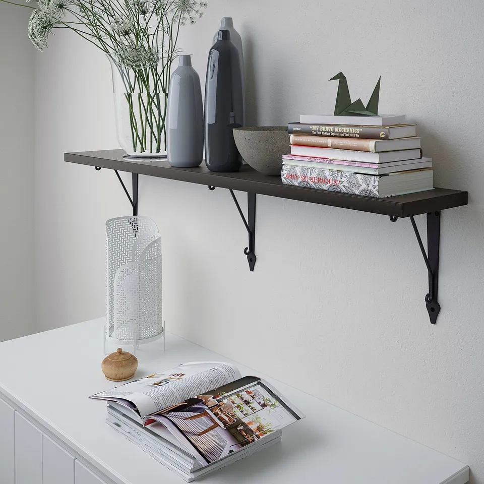 Wall shelf with vases, books, plant.