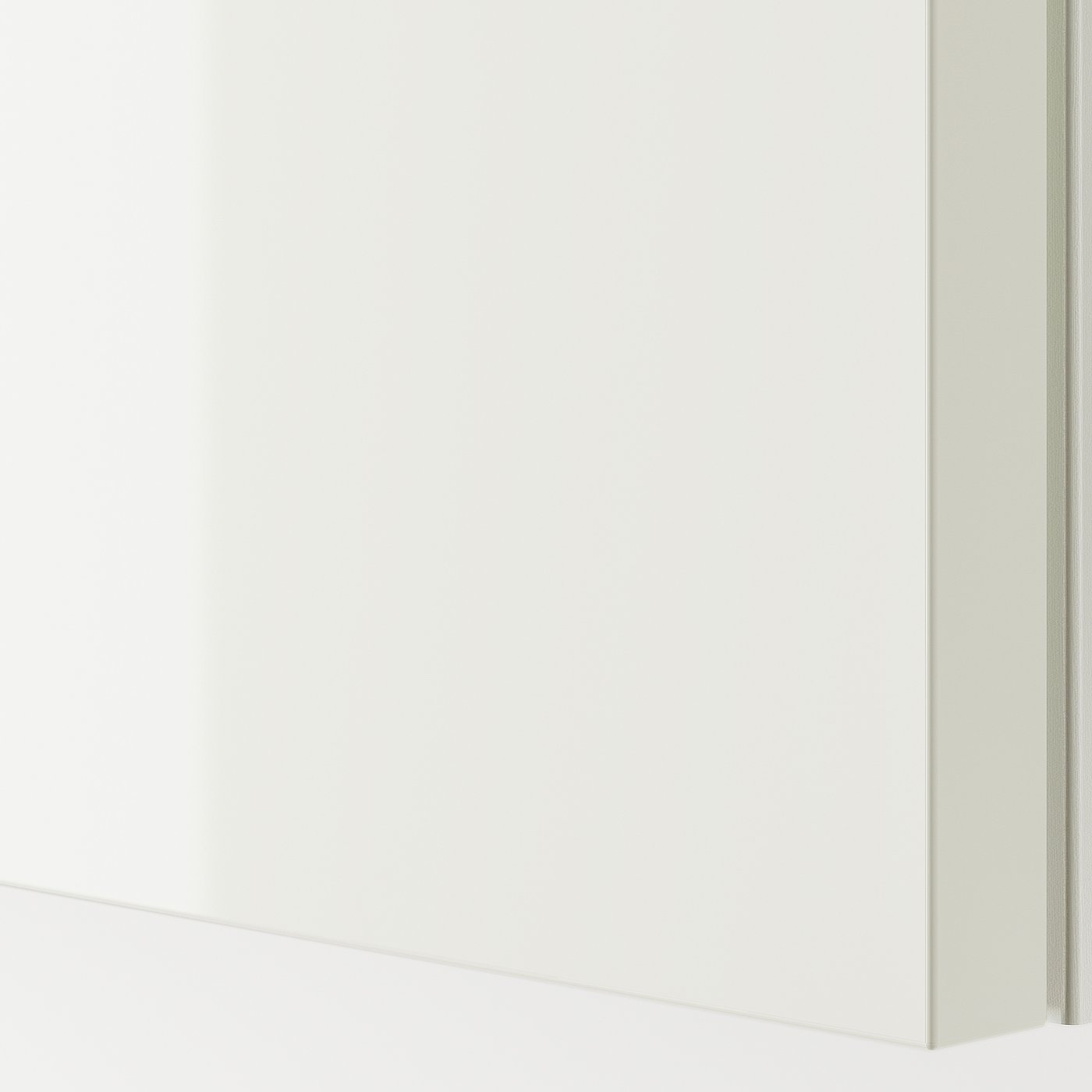 Close-up of glossy white sliding door, showcasing sleek, reflective finish and modern design.