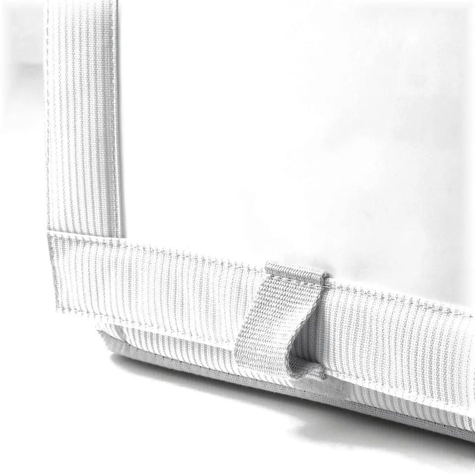 Grey fabric shoe box corner with durable stitching.