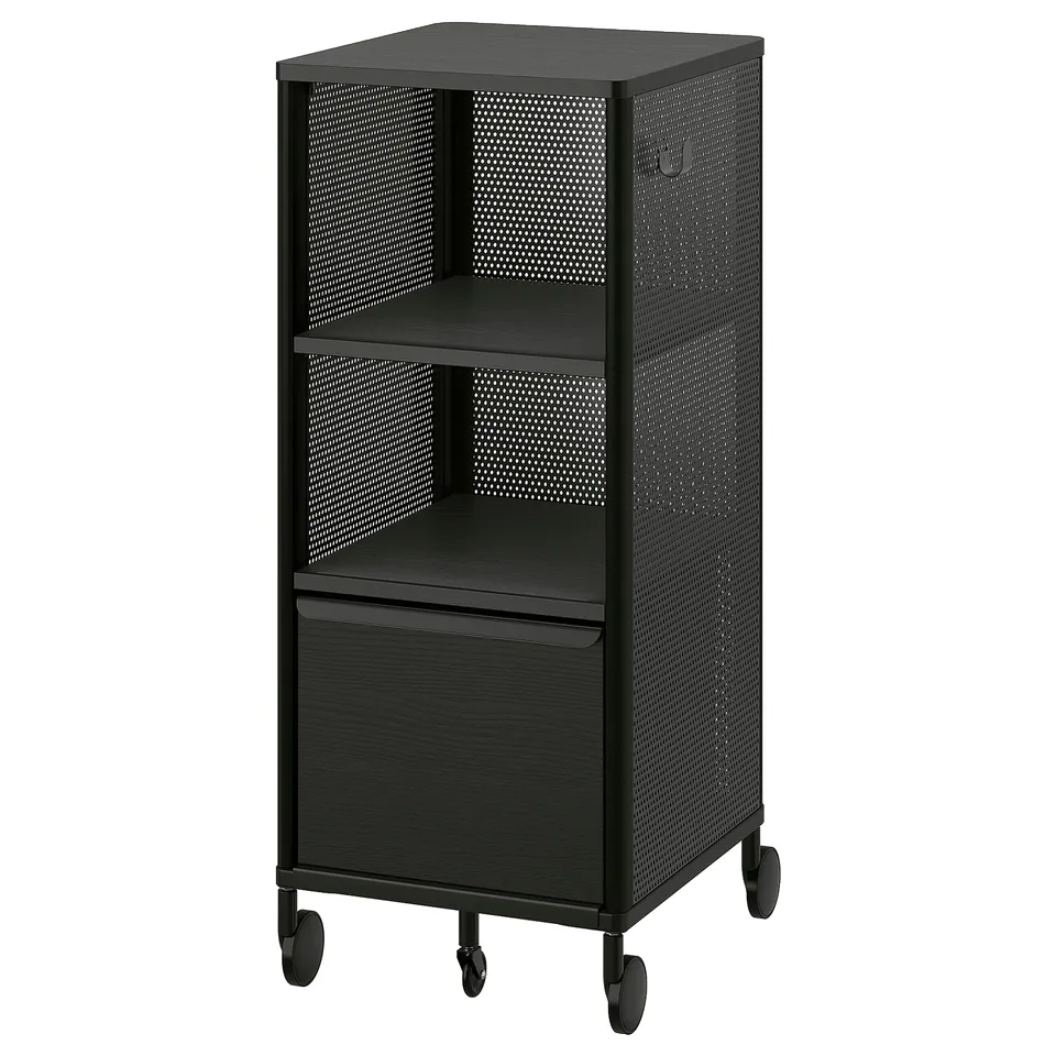 Black BEKANT mobile storage with shelves, drawers, wheels, and mesh panels.