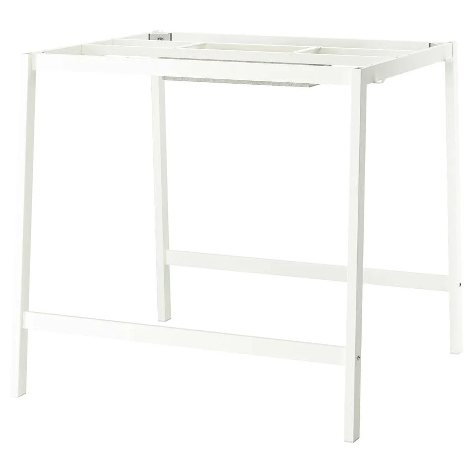 A white MITTZON desk with a metal frame. Its rectangular, has a simple design, and includes basic cable management for organisation.