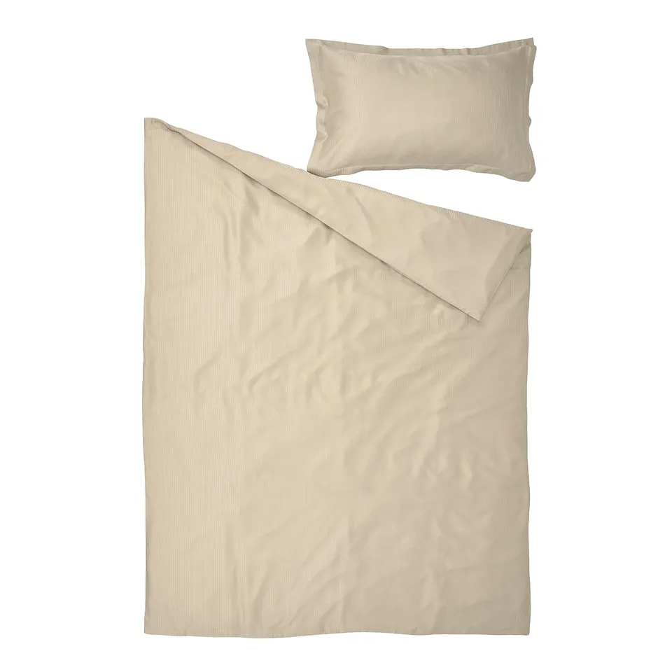Cream bed set: duvet, pillow, 100% lyocell.