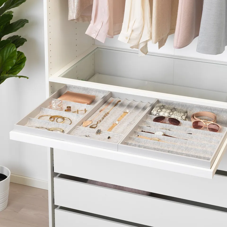 White dresser drawer with jewellery tray and compartments.
