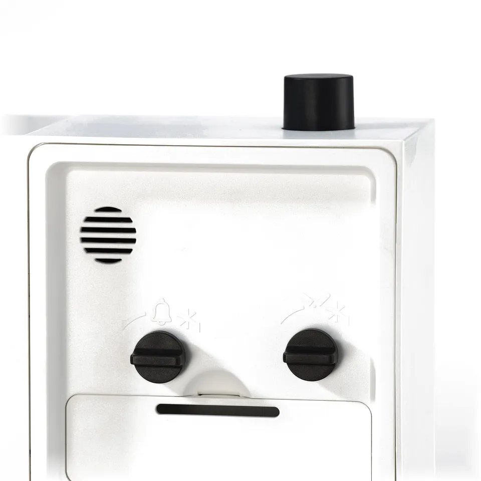 White appliance with 3 knobs, modern design.