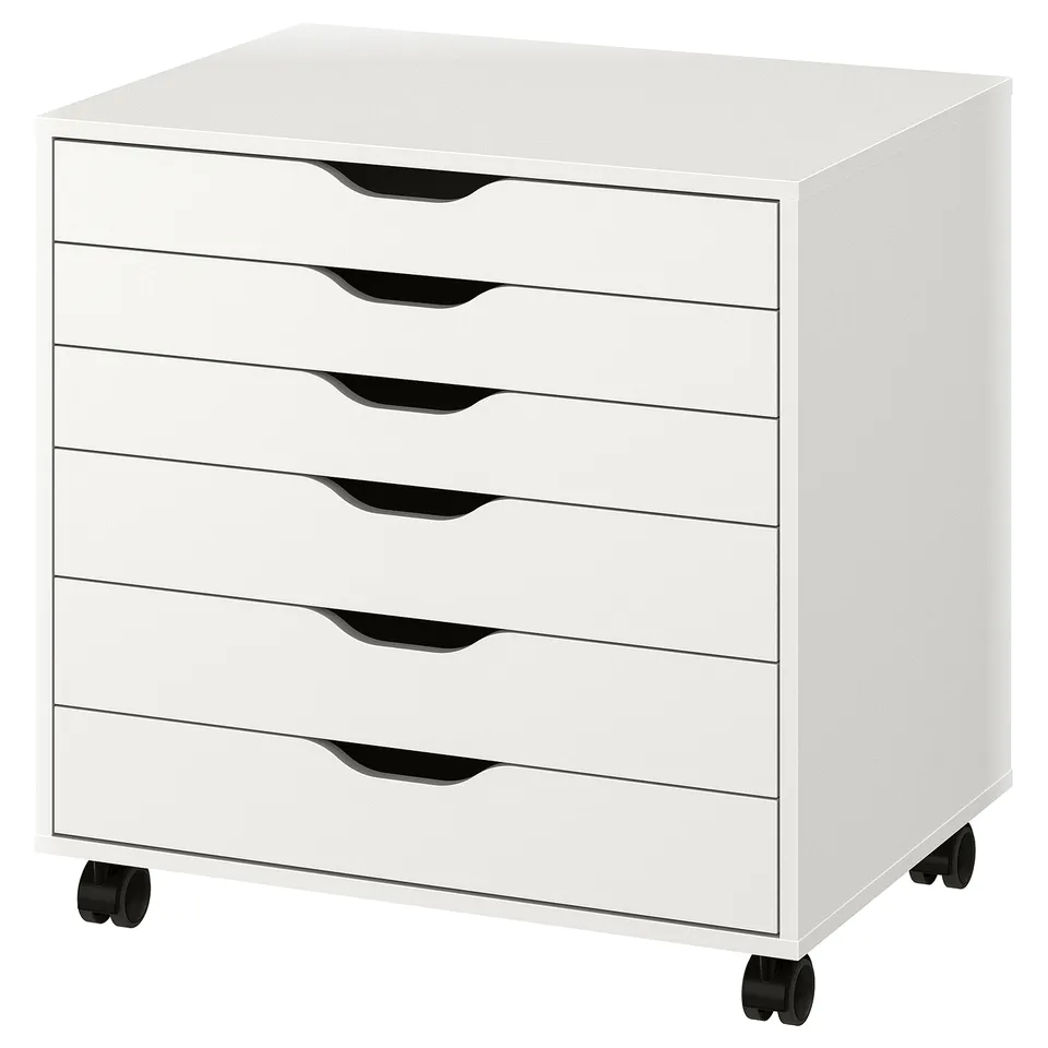White ALEX storage unit with six drawers, black handles, and wheels. Modern, simple design for versatile use.