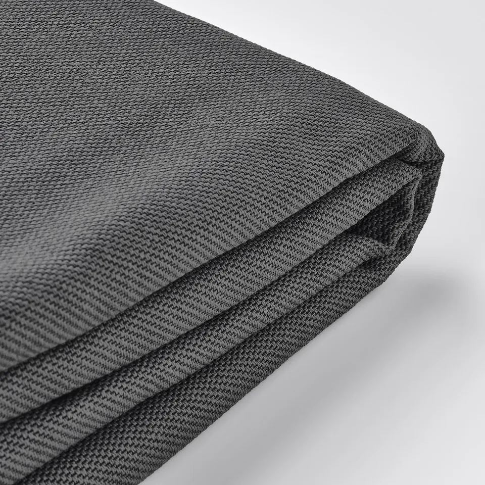 Close-up of grey textured sofa cushion, showcasing high-quality fabric with subtle two-tone effect.