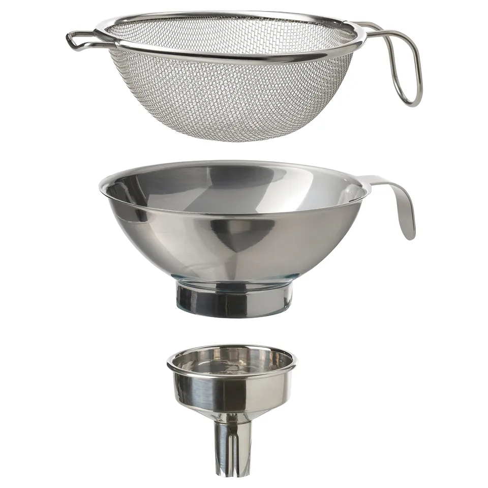 Three-piece stainless steel kitchen set: strainer, funnel, and sieve, all silver, ideal for food preparation.