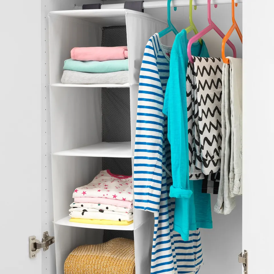 Hanging wardrobe organiser with five compartments for foldables and three hanging items.