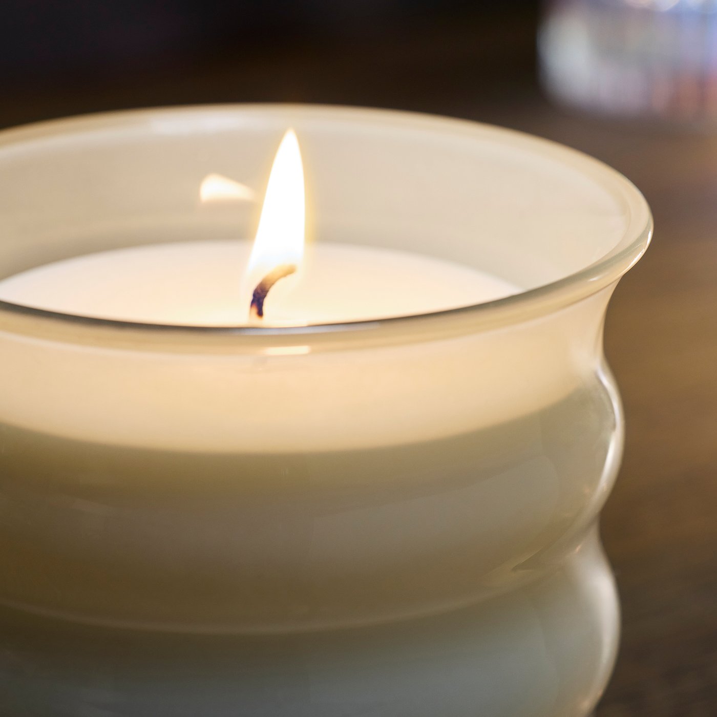JUVELTRAST Scented candle in glass, pink flowers pale beige, 50 hr