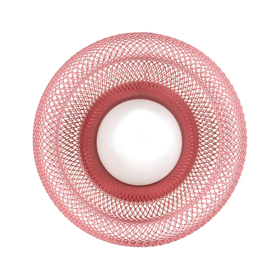 A pink mesh lamp with a white globe inside, showcasing its modern design and diffused light.