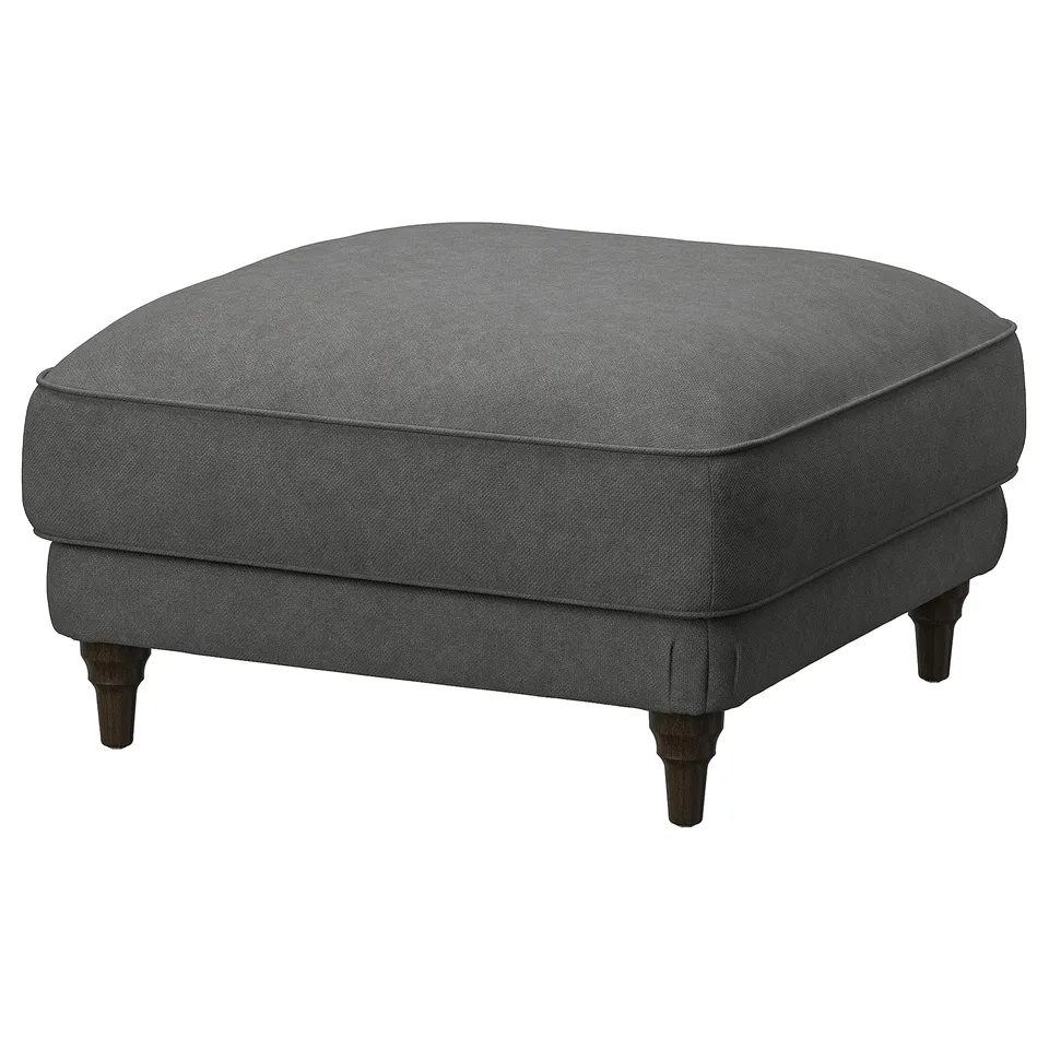 An ESSEBODA footstool in grey with turned wooden legs and a plush, rectangular shape for comfort.