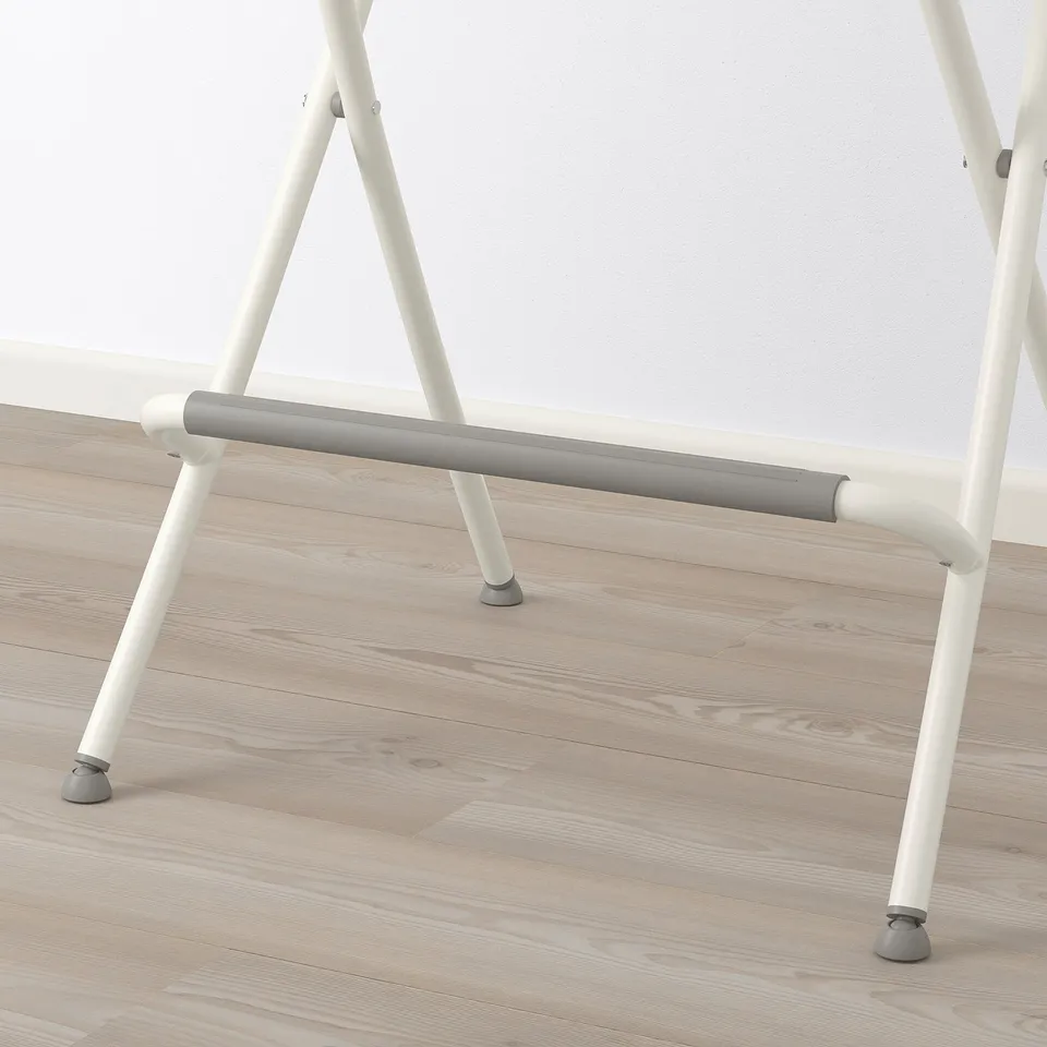 Modern white bar stool with grey footrest and non-slip feet.