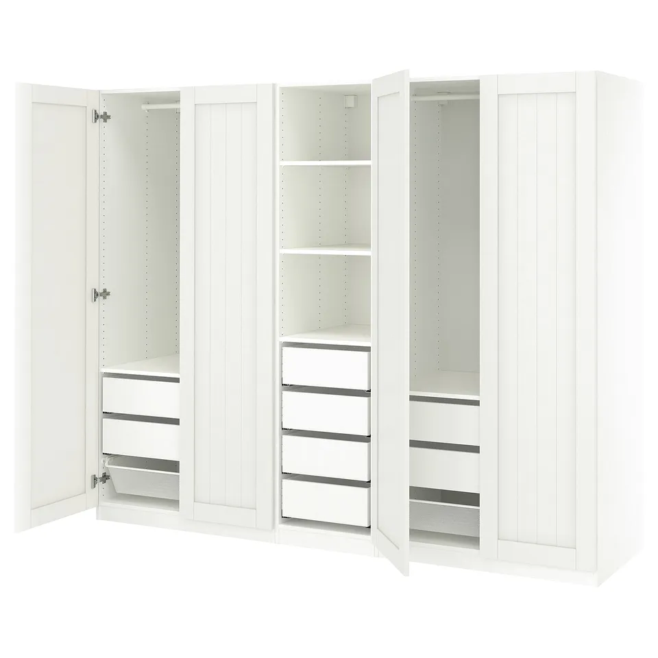 White PAX wardrobe with open doors, shelves, and drawers.