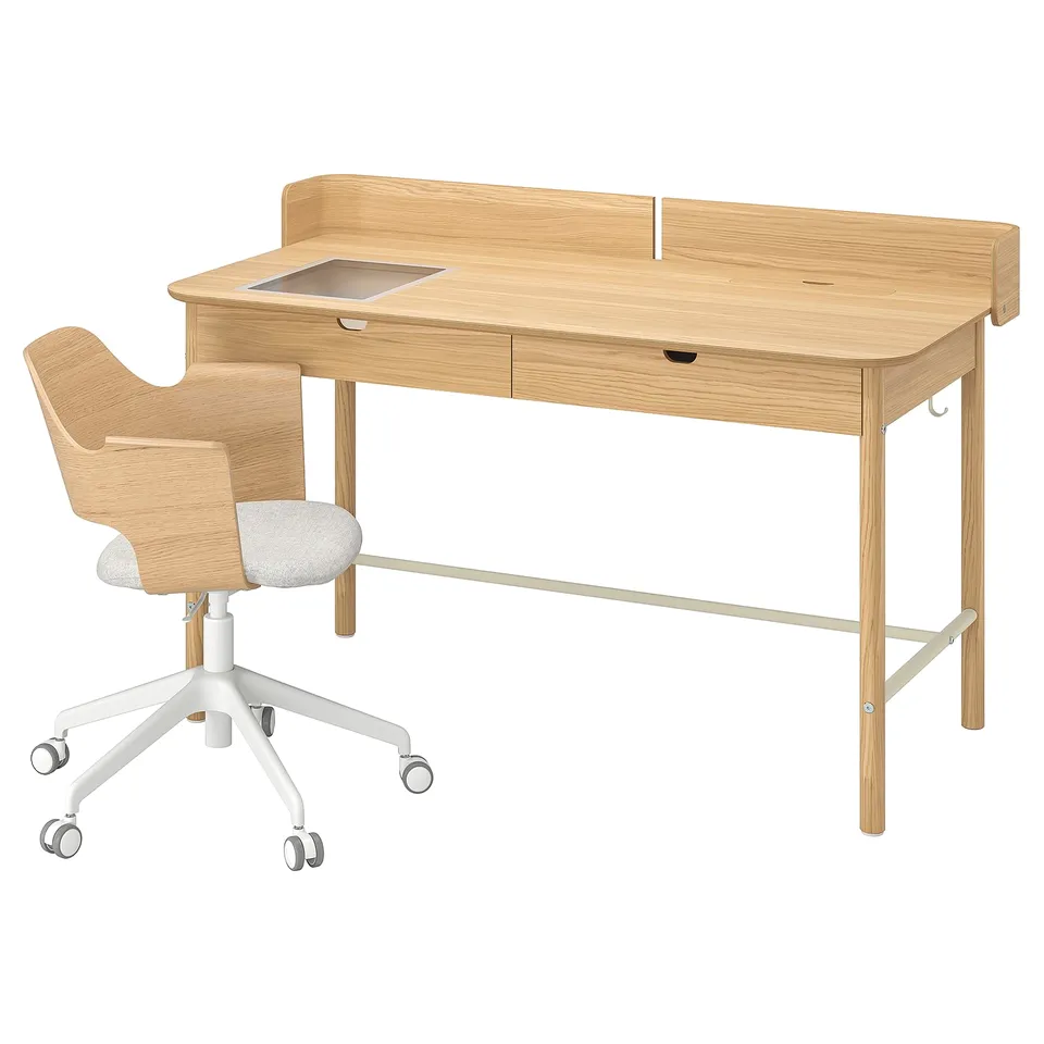 RIDSPÖ light wood desk and fjällberget chair. Desk has drawers, cable management, and shield. Chair has white base, casters, and light wood seat.