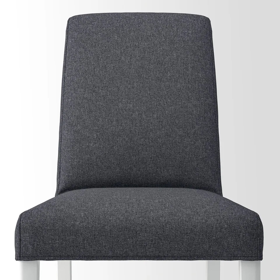 High-quality, upholstered dark grey dining chair with sleek design, offering comfort and style.