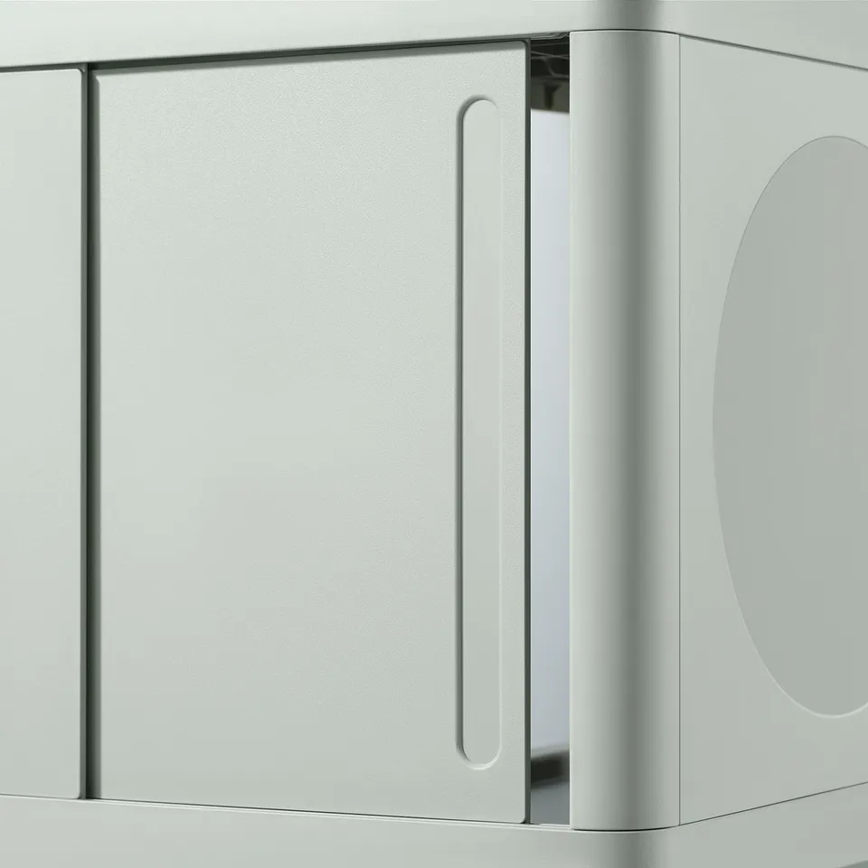 Silver IVÖSJÖN washbasin cabinet with sleek, sliding door, blending modern design and efficient storage.