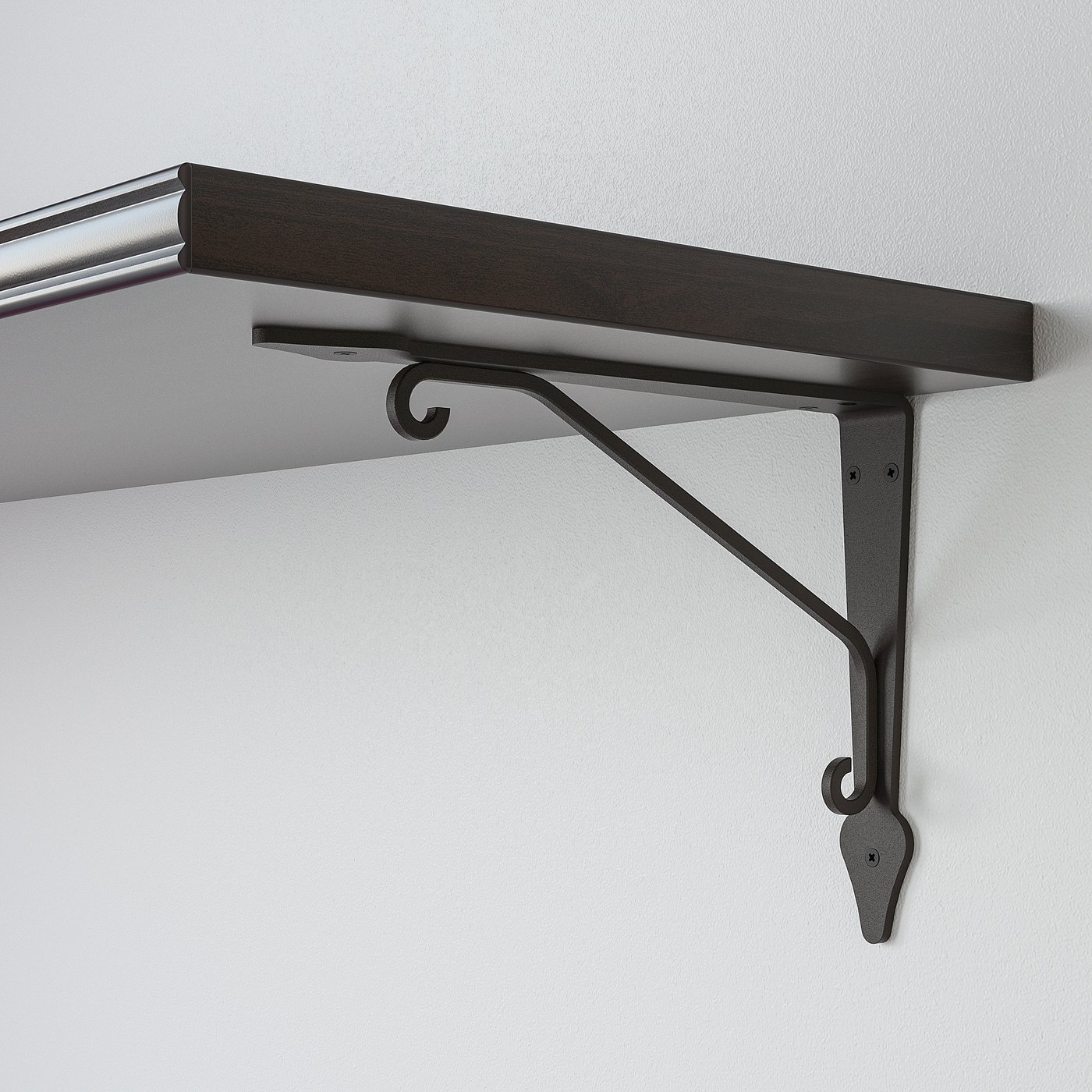 Wooden shelf mounted on wall with sturdy black metal bracket. Elegant bevelled edge on one side.