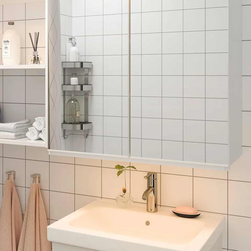 Bathroom sink with led under-cabinet lighting.