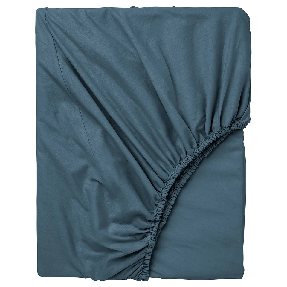 Folded blue DVALA bed sheet, smooth texture, elastic hemline, rectangular.