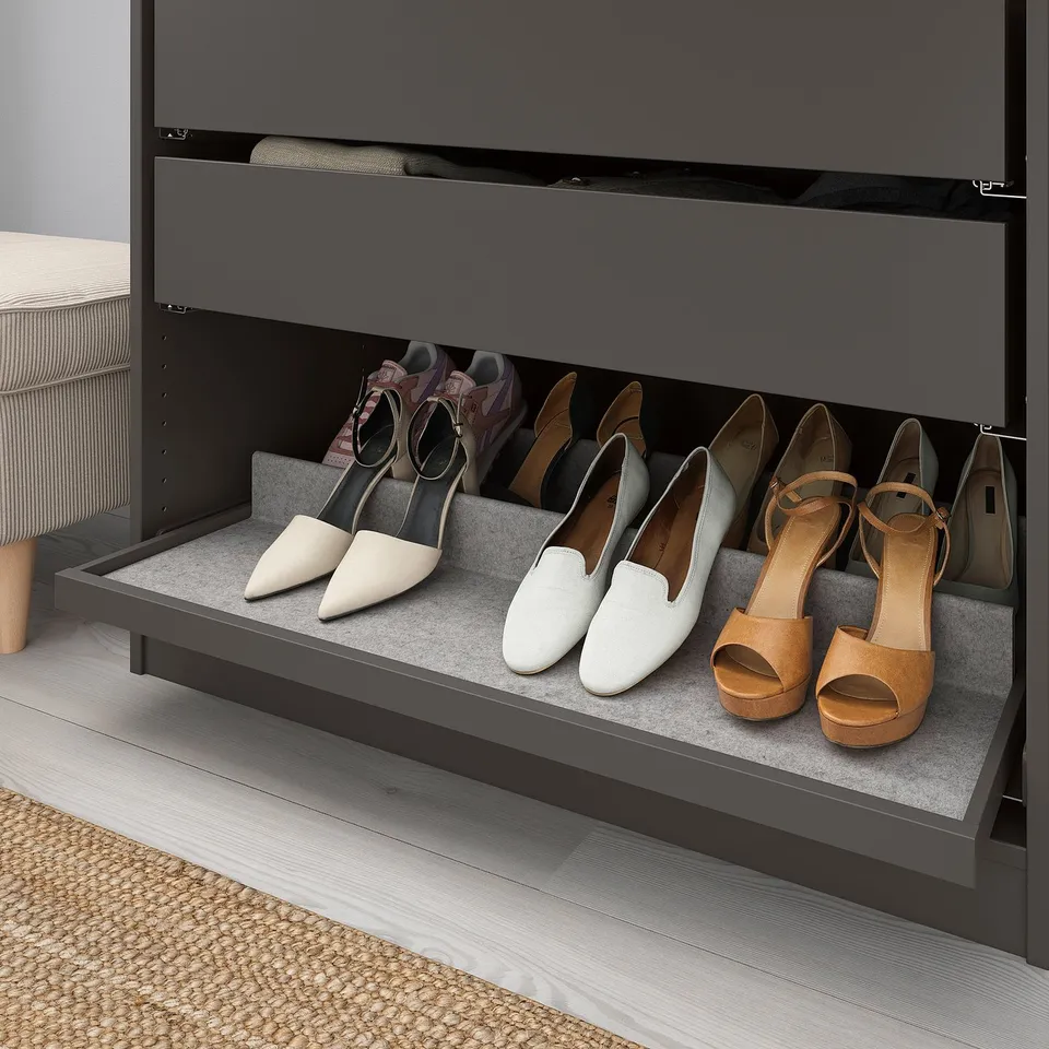 Shoe storage shelf with felt lining for displaying and protecting footwear.