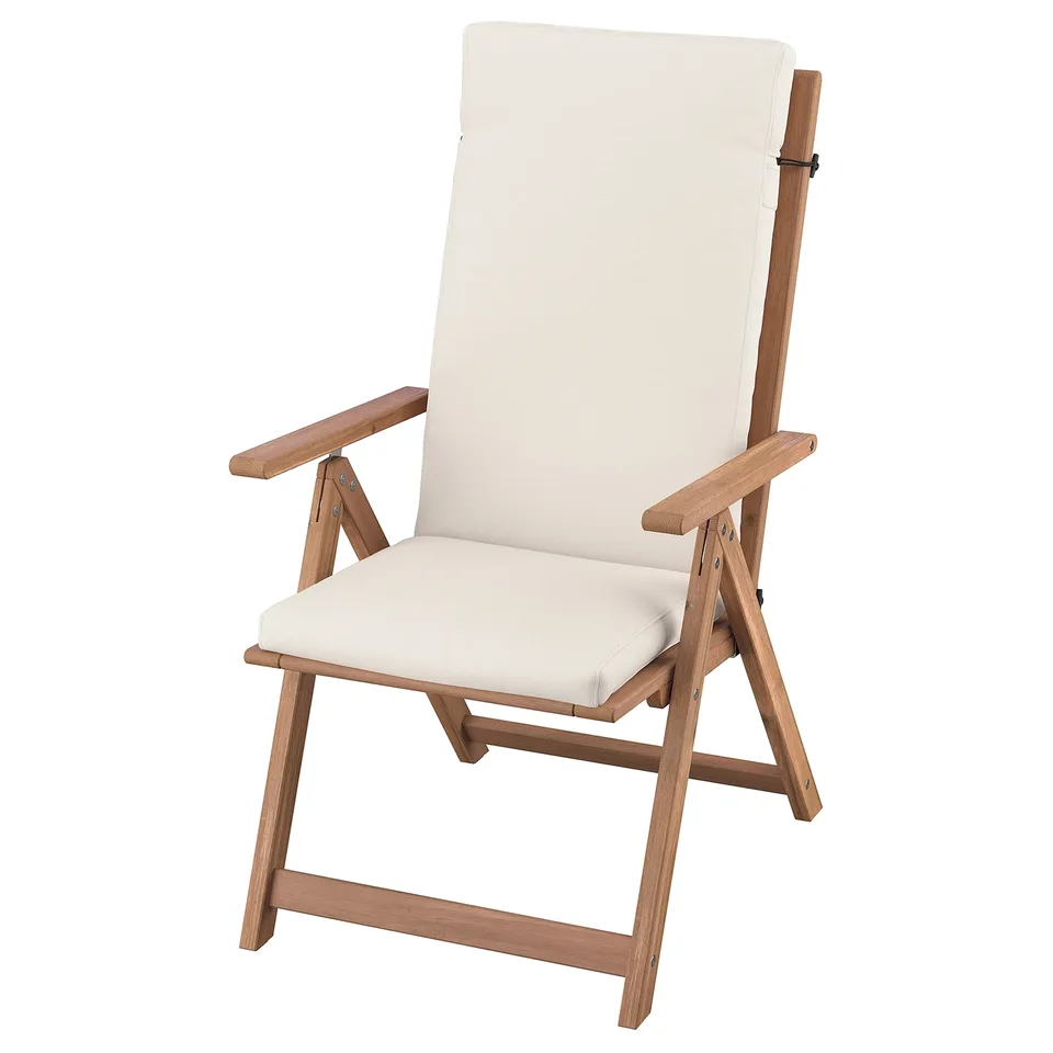 The NÄMMARÖ reclining chair is a light beige wooden outdoor chair with foldable design, providing comfort for outdoor relaxation.