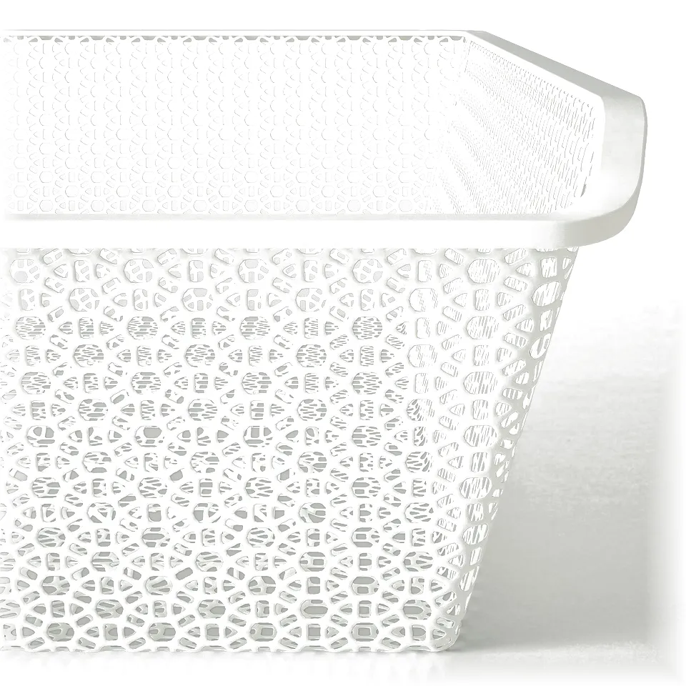 White metal mesh basket with intricate patterns, stacked neatly, showcasing quality design and durability.