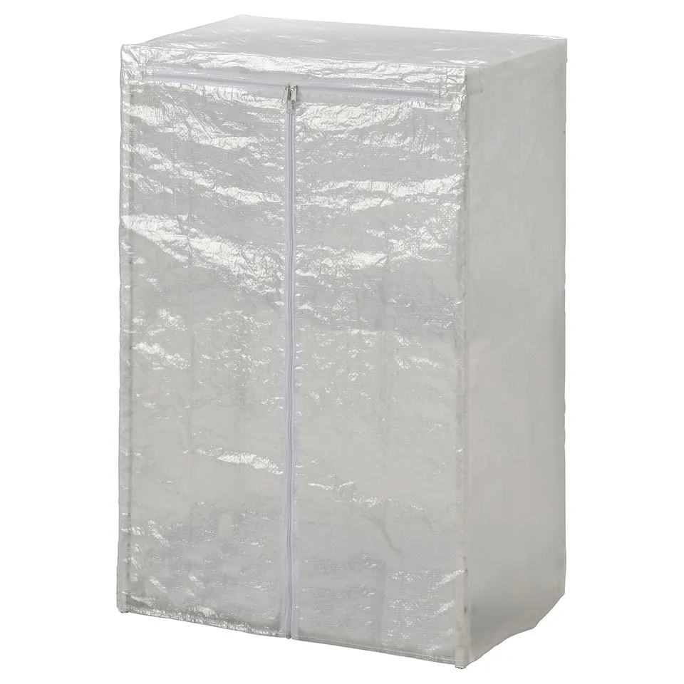 The JOSTEIN storage cover in white. The square shape a front zip, made of polyester and polyethylene, designed for indoor and outdoor use.