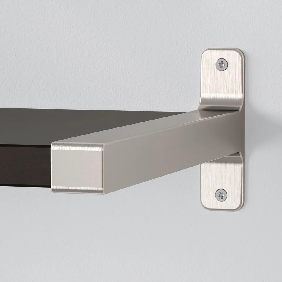 Modern metal bracket securely holding a sleek wall shelf. Adjustable, high-quality finish.