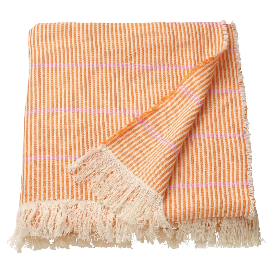 LAPPKATTFOT throw: bright orange-pink striped cotton, fringed edges.