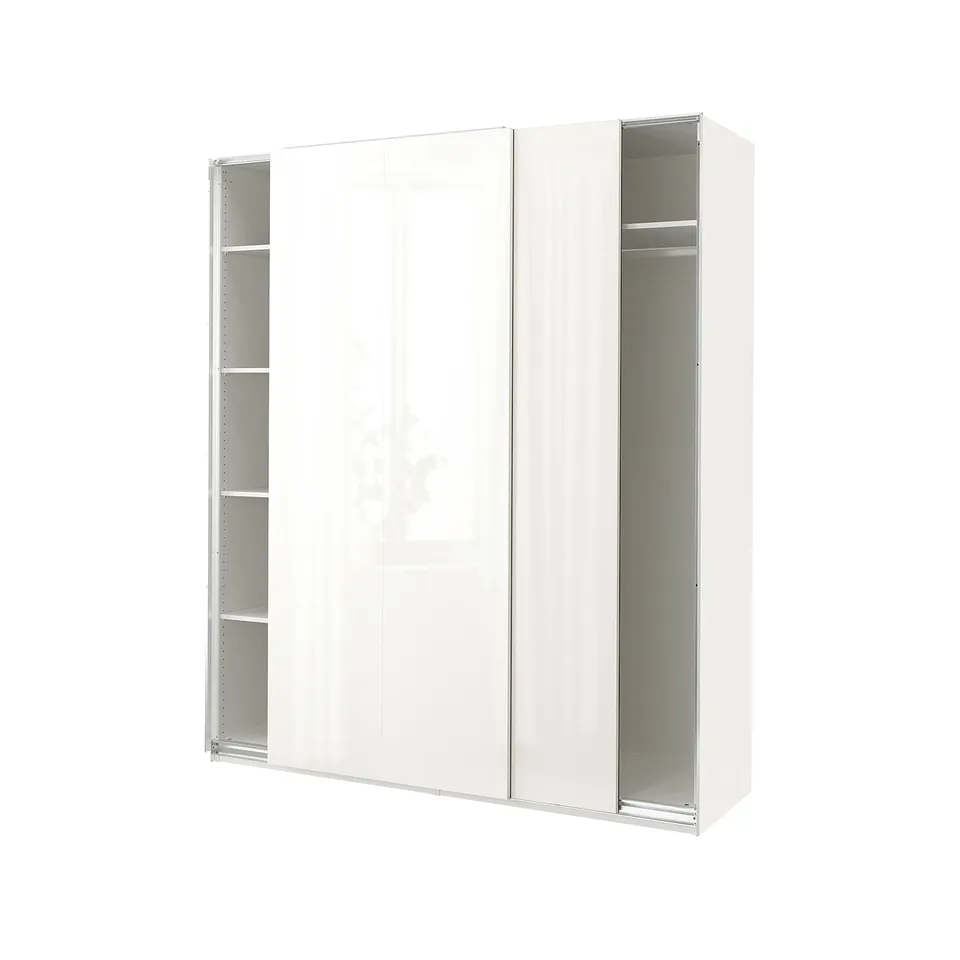 A white PAX wardrobe with sliding doors and shelves.