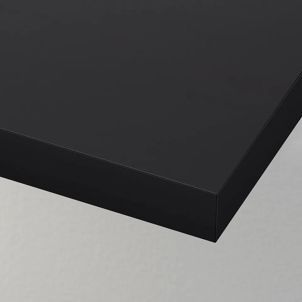 Black sleek surface, sharp edges, seamless finish. Minimalist design, high-quality material.