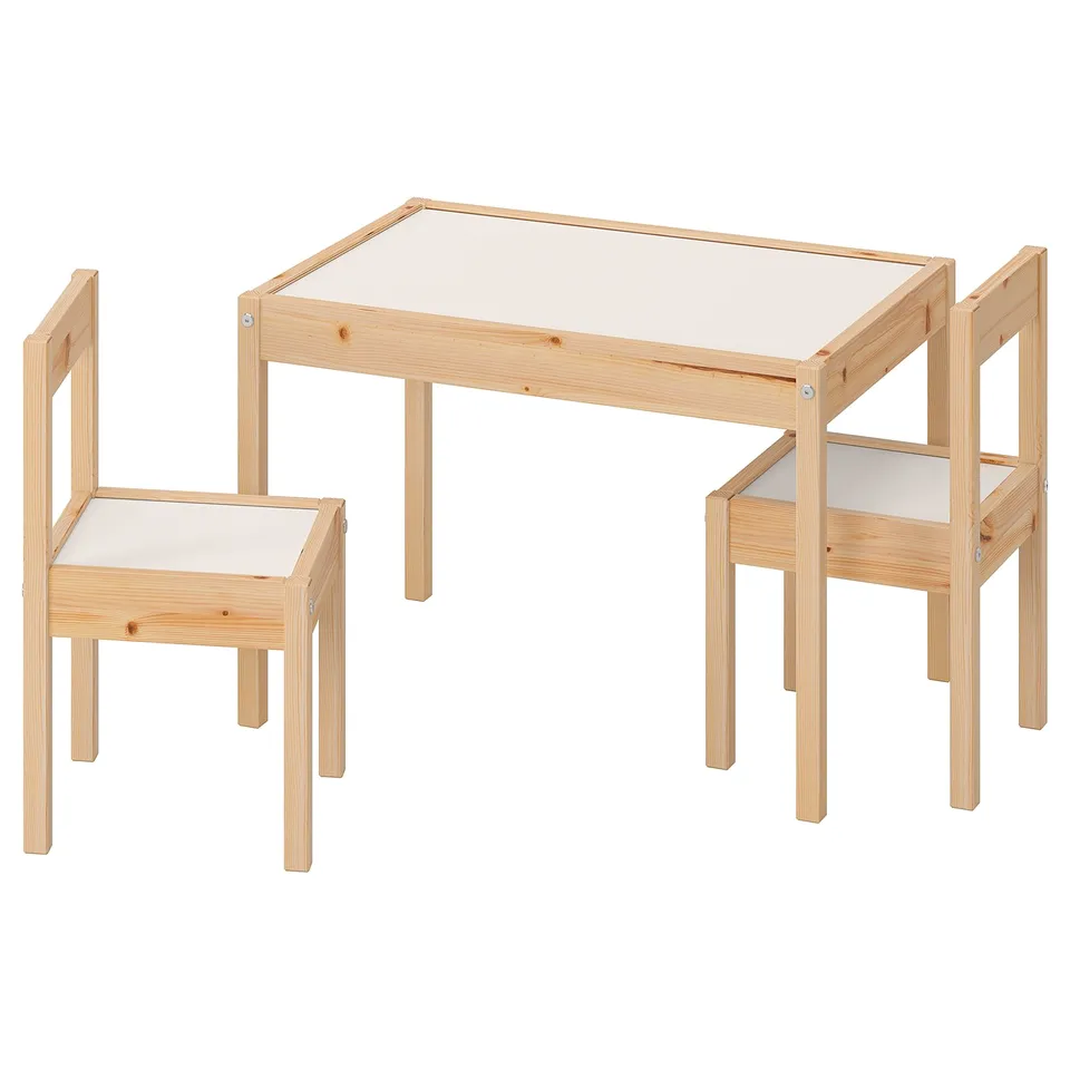 A natural wood kids set with a table and two chairs. The set a simple, square design with white-top surfaces. It is suitable for small spaces.