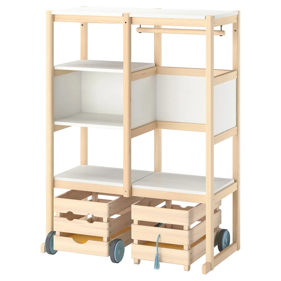 The FLISAT storage unit in light birch colour. It has wooden shelves and wheels, ideal for organising clothes and toys.