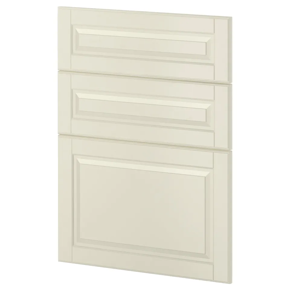 A white METOD kitchen cabinet with bevelled edges. It has a traditional design with multiple sections.