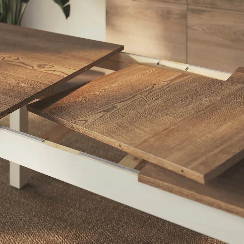 Wooden table with extending section. Easy to adjust for extra seating.