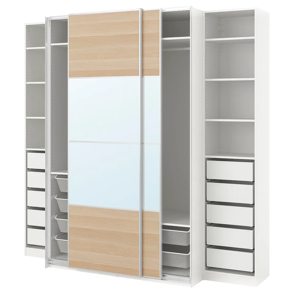 Modern white PAX wardrobe with light wood doors, mirrored centre, shelves, and drawers.