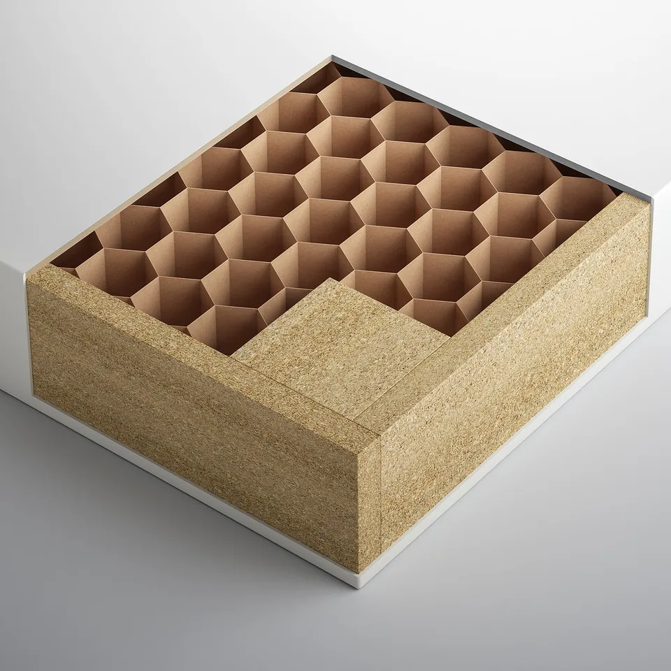 Modular storage box with honeycomb paper interior, particleboard sides, and plastic edging.