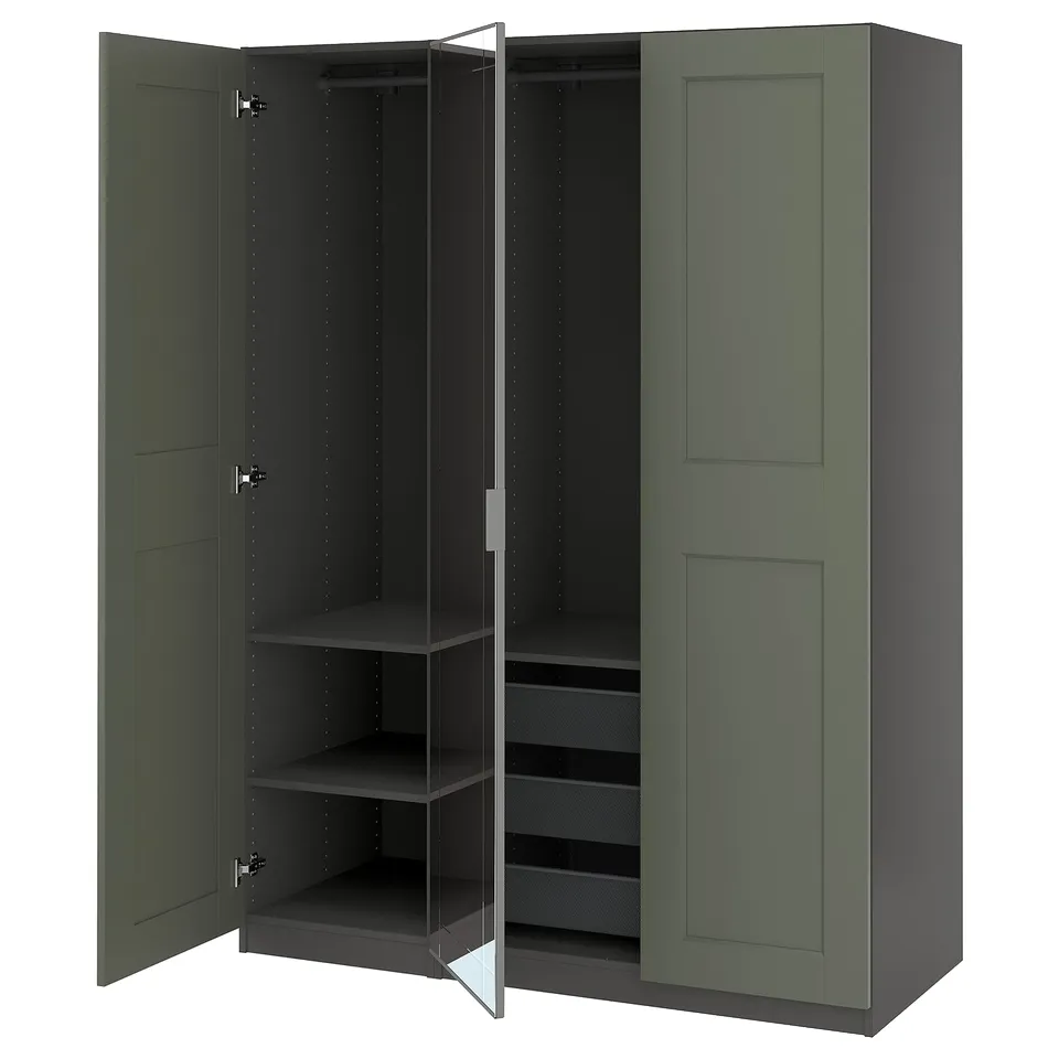 An open green PAX wardrobe with shelves and mesh drawers.