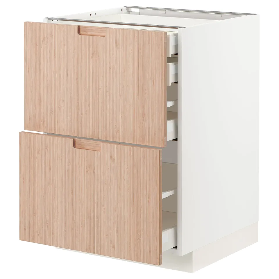 A white METOD kitchen cabinet with light bamboo drawers, featuring a modern, natural look with smooth, soft-closing drawers.