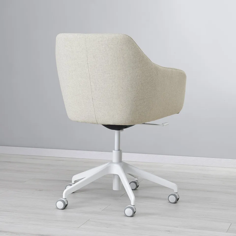TOSSBERG modern office chair with cushioned seat, white base, rollerblade wheels, minimalist design.