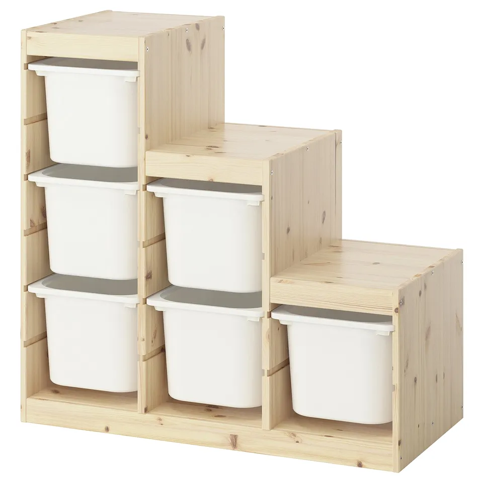TROFAST light wood storage with six white plastic bins, perfect for childs room.