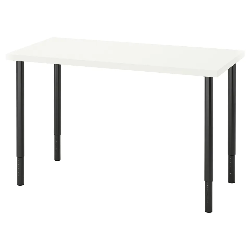 An adjustable white LAGKAPTEN desk with four black metal legs.