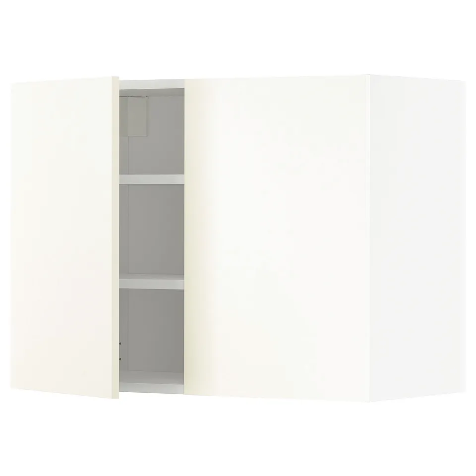 A white METOD kitchen cabinet, featuring a clean design, three adjustable shelves, and sturdy construction.