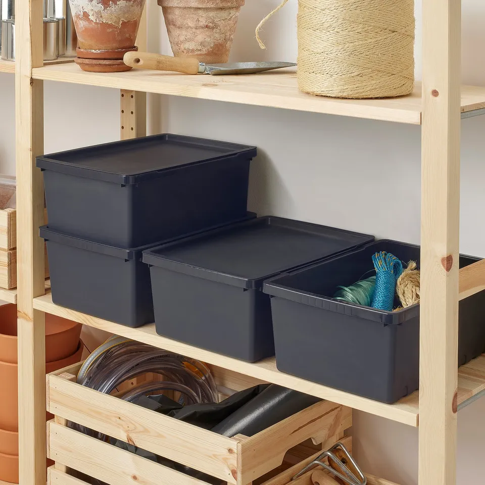 Wooden shelf with grey plastic storage boxes, one open showing ropes. Lid sold separately.
