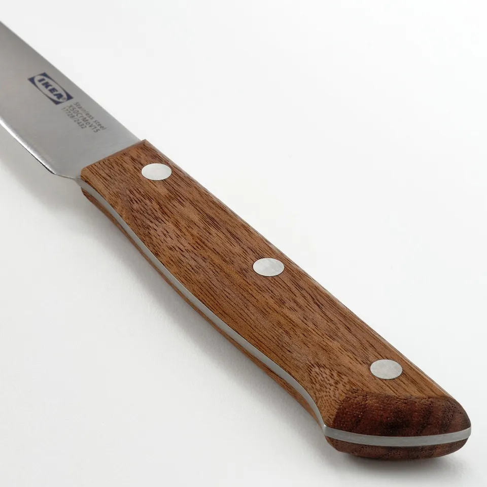 A sharp, high-quality kitchen knife with a wooden handle. The blade is stainless steel and the handle three metal rivets for durability.