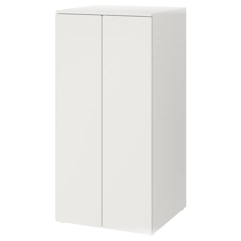 This image shows a white ikea SMÅSTAD cabinet, rectangular and two-doored, for storing children's items.