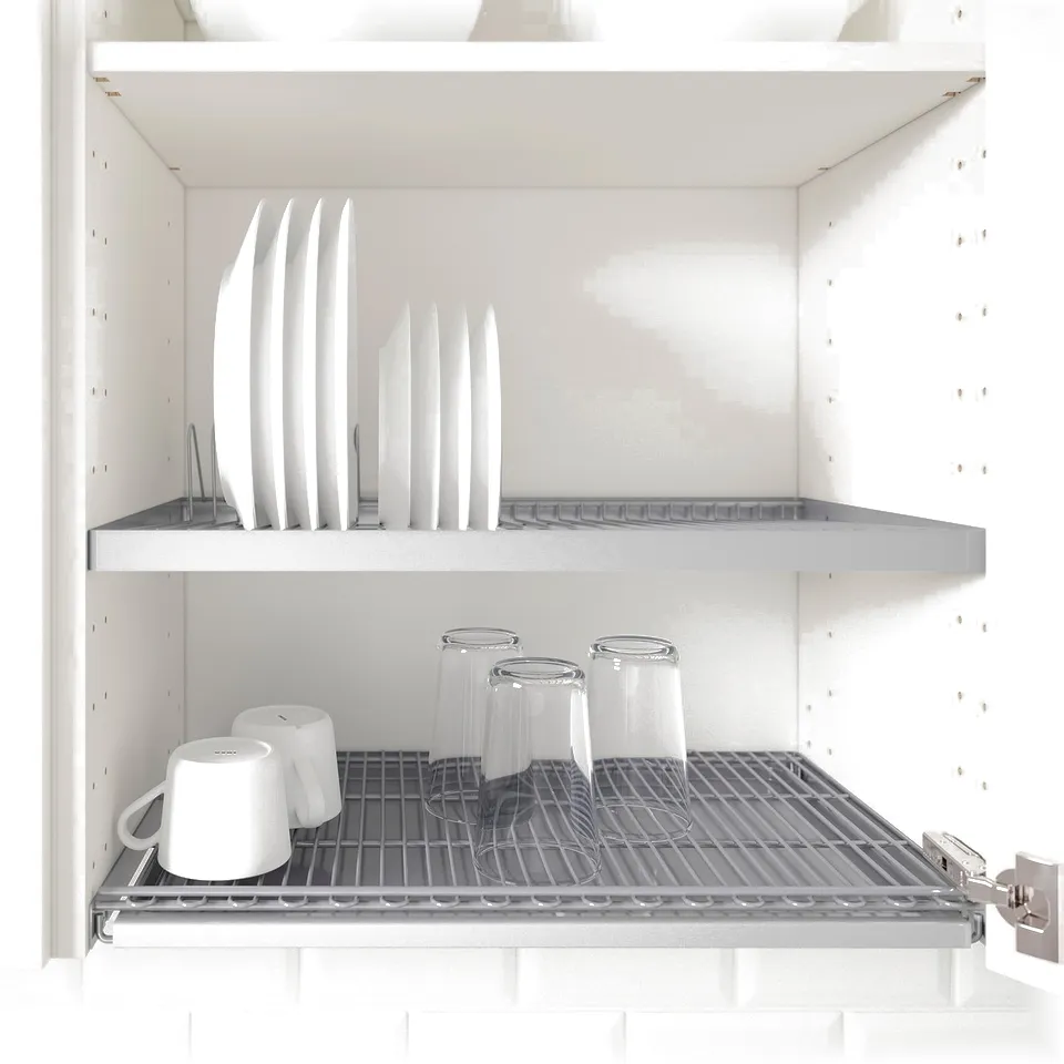 Kitchen cabinet with adjustable shelves holding white mugs and clear glasses; metal racks visible.