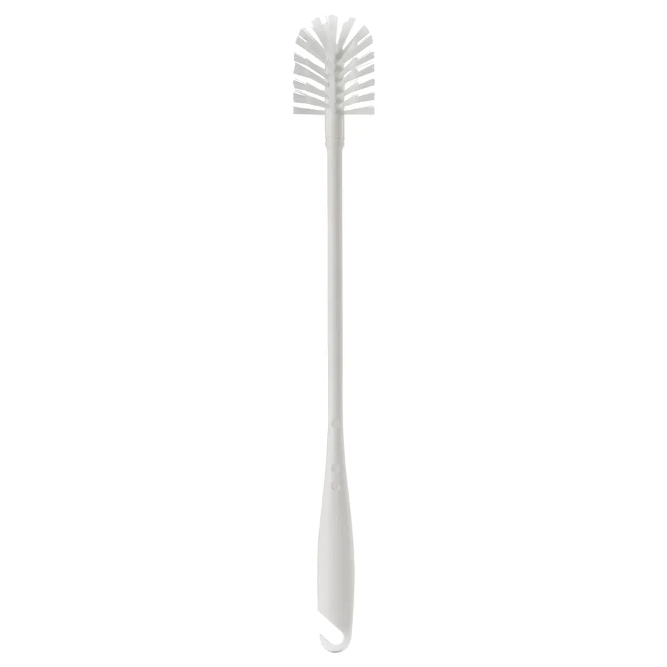A white medevåg bottle brush. It a long handle and soft bristles for cleaning narrow jars.
